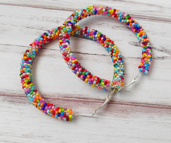 Colorful-beaded-hoop-earrings-multicolor-seed-bead-jewelry-big-hoops-native-american-beadwork-jewelry-handmade-statement-earrings.jpeg