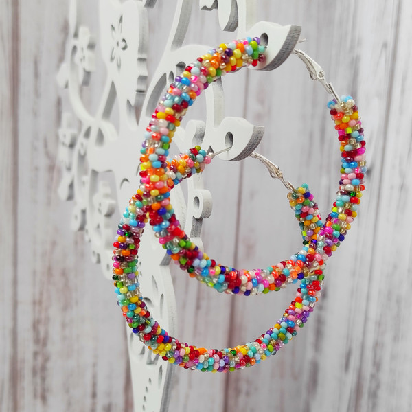 Colorful-beaded-hoop-earrings-multicolor-seed-bead-jewelry-big-hoops-native-american-beadwork-jewelry-handmade-statement-earrings.jpeg