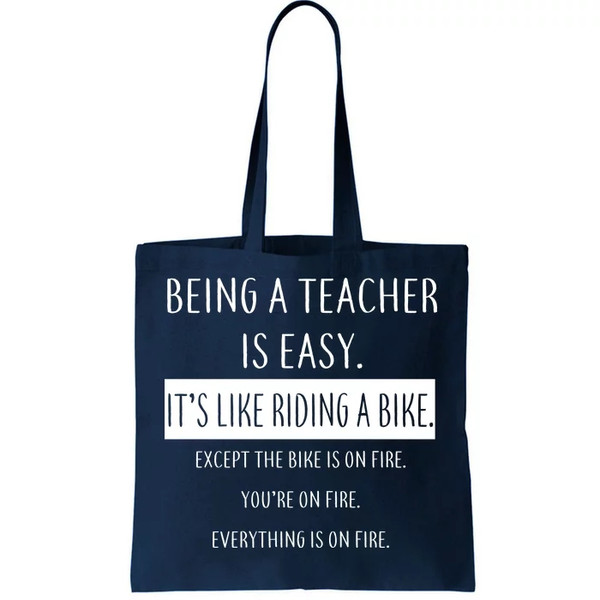 Being A Teacher Is Like Riding A Bike Tote Bag.jpg
