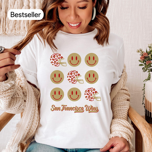 https://www.inspireuplift.com/resizer/?image=https://cdn.inspireuplift.com/uploads/images/seller_products/25581/1702062570_SanFrancisco49ersShirtforWomen49ersShirtWomen49ersGameDayFootballtshirtCute49ersApparelSanFranciscoFootballShirtLadies.jpg&width=600&height=600&quality=90&format=auto&fit=pad