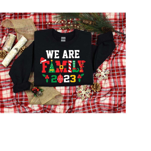 Christmas Sweatshirt, We Are Family Shirt, Christmas Family Vacation Shirt, Family Matching Shirt, 2023 Christmas Holida.jpg