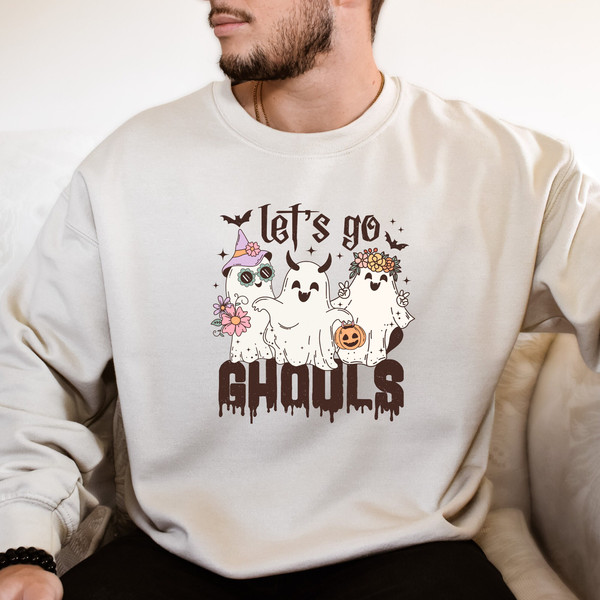 Let's Go Ghouls Vintage 2023 Halloween Sweatshirt with Retro Ghost Design, Perfect for Spooky Season & Fall.jpg