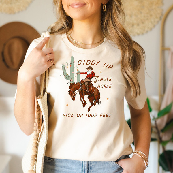 Giddy Up Jingle Horse Pick Up Your Feet Christmas Cowgirl Shirt, Western Christmas, Christmas Horse Gift Shirt, Howdy Country Christmas Tee,.jpg