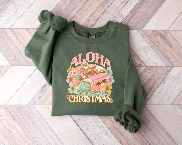 Aloha Christmas Santa Shirt, Retro Santa Summer T-shirt, Santa Beach Sweater, Pink Santa Surfing Sweatshirt, Christmas Cow, Christmas Gifts.jpg