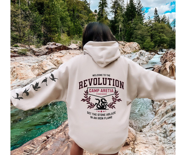 Iron Flame Revolution Hoodie with sleeve dragons, welcome to the revolution on back with left sleeve dragons, Iron FlameFourth Wing fans.jpg