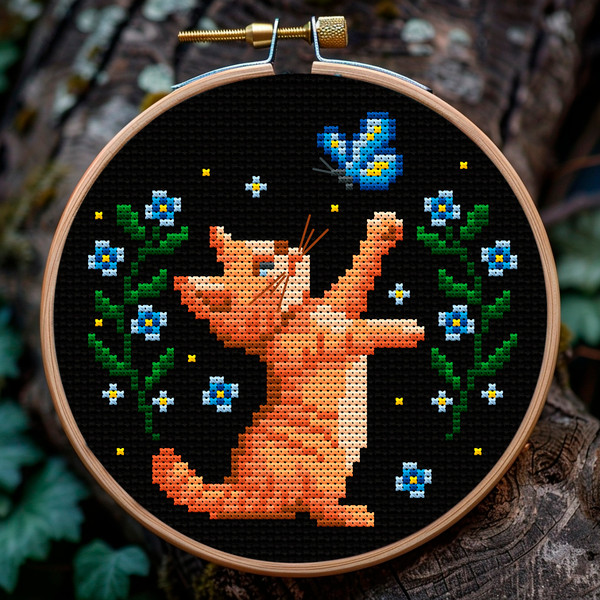 Butterfly catcher Xstitch 4.jpg