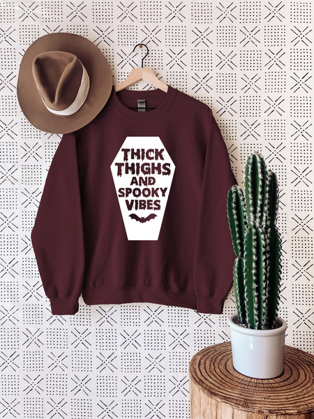 Thick Thighs and Spooky Vibes Sweater, Halloween Sweatshirt, Halloween Gift, Funny Halloween Outfits.jpg