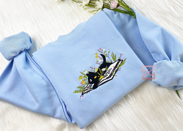 Cute Cat Lying On Book With Flower Embroidered Sweatshirt  Flower With Cat Embroidered Hoodie  Book Lover T-shirt  Crew Neck Sweatshirt.jpg