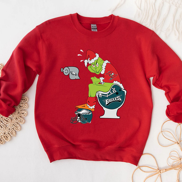 3Grinch Tampa Bay Buccaneers and Eagles Graphic Hoodies.jpg