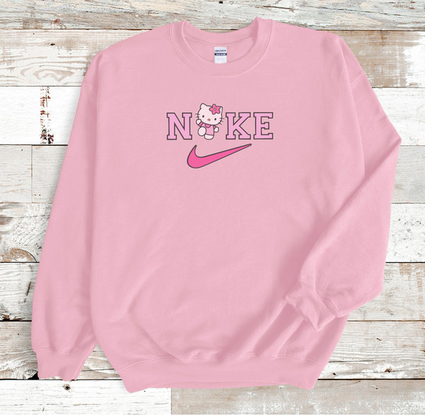 classic hello kitty nike pink sweatshirt.jpg