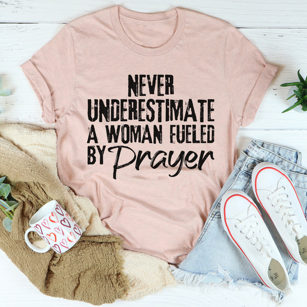Never Underestimate A Woman Fueled By Prayer Tee (3).jpg