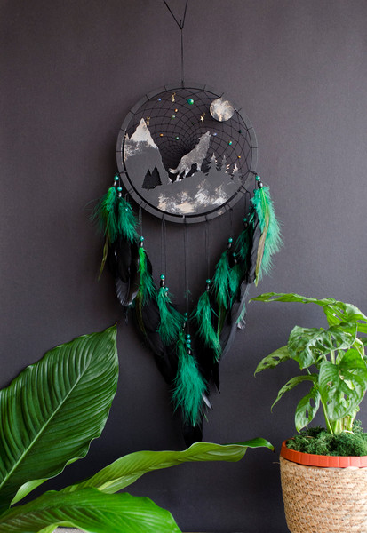 wolf dream catcher with black and green feathers 1.jpg
