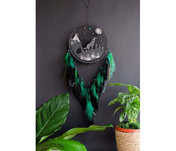 wolf dream catcher with black and green feathers title.jpg
