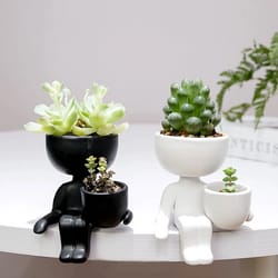 human shaped ceramic sitting flower pots