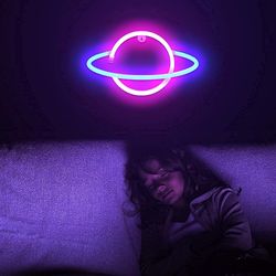 whimsical neon planet wall light