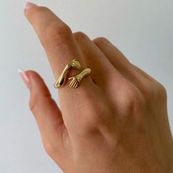 hugging hands ring