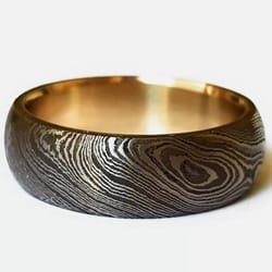 infinite love: handcrafted damascus steel ring with brass detailing - blademaster