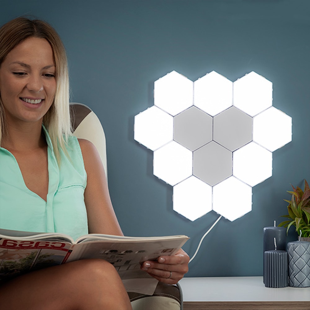 Living room featuring Hexagon Modular Touch LED Tile Lights with customized lighting patterns