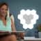 Living room featuring Hexagon Modular Touch LED Tile Lights with customized lighting patterns