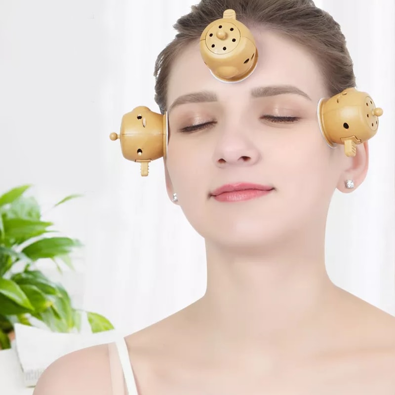 Applying Moxa Cupping Therapy on Shoulder for Joint Pain