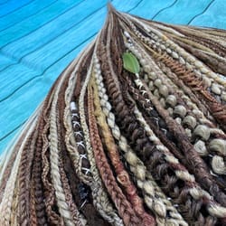 synthetic mix brown de crochet dreads and diffrerent styles braids,fishtail braids, curly braids