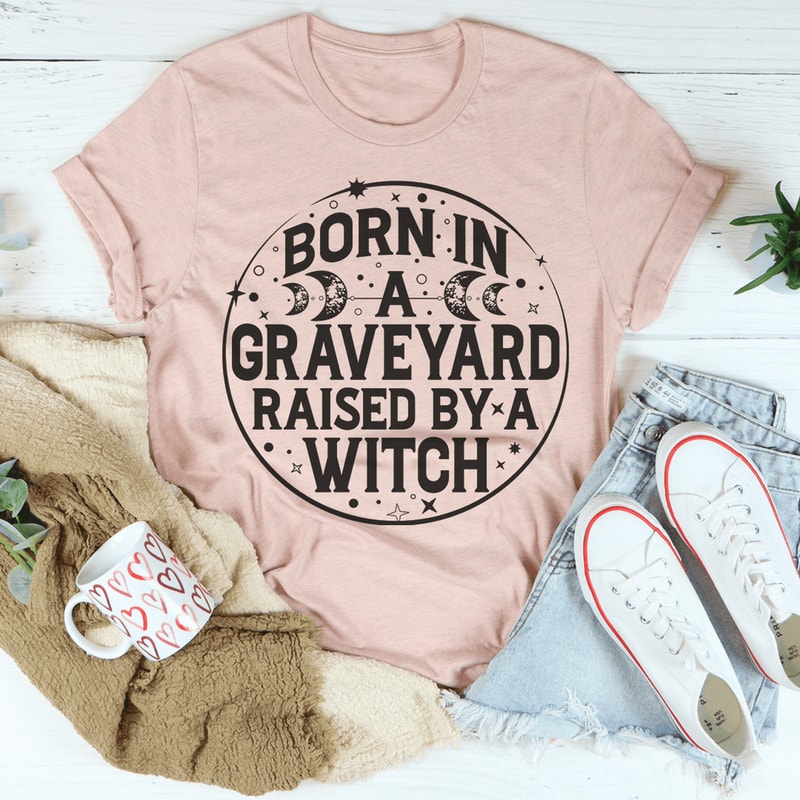 born-in-a-graveyard-raised-by-a-witch-tee-peachy-sunday-t-shirt