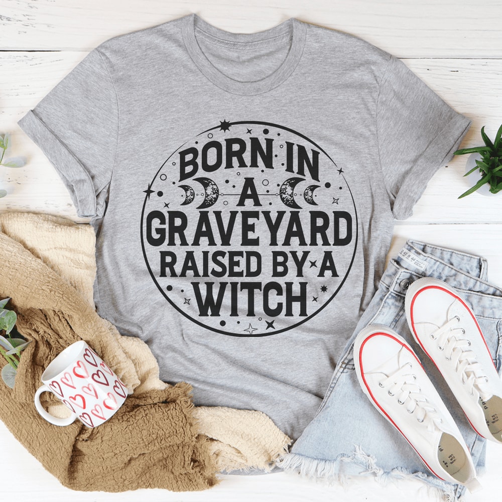 born-in-a-graveyard-raised-by-a-witch-tee-peachy-sunday-t-shirt
