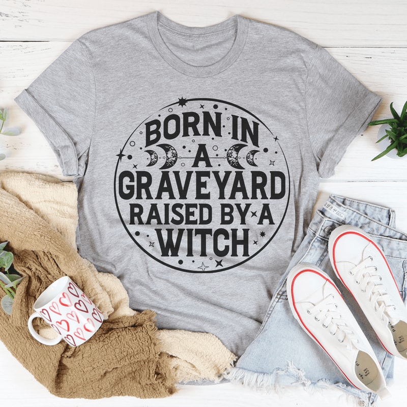 born-in-a-graveyard-raised-by-a-witch-tee-peachy-sunday-t-shirt