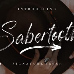 sabertooth signature brush trending fonts - digital font