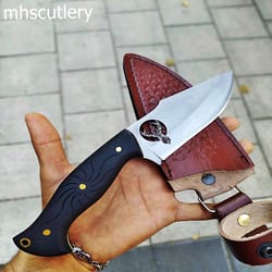 custom handmade stainless steel engraved bushcraft hunting skinner knife with wood handle and leather sheath.