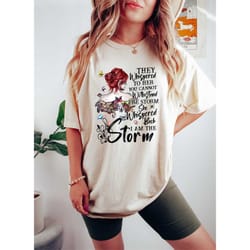 they whispered to her you cannot withstand the storm shirt, she whispered back i am the storm shirt, woman appreciation,