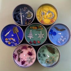handmade aromatherapy candles, with crystal dried flowers, in an antique copper silver tin can
