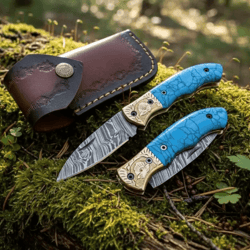 custom damascus steel folding knife set | blue turquoise handle + brass engraved bolsters | leather sheath | 7.5" liner