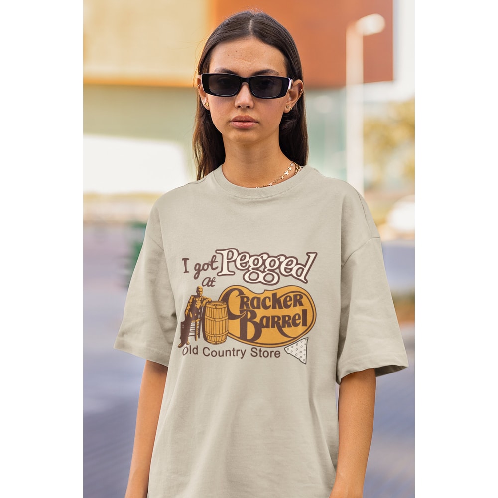 I Got Pegged At Cracker Barrel, Funny Meme Shirt, Unhinged Gift Exchange, Stupid Logo Shirt Ridiculous Swap, Offensive Shirt Inappropriate.jpg