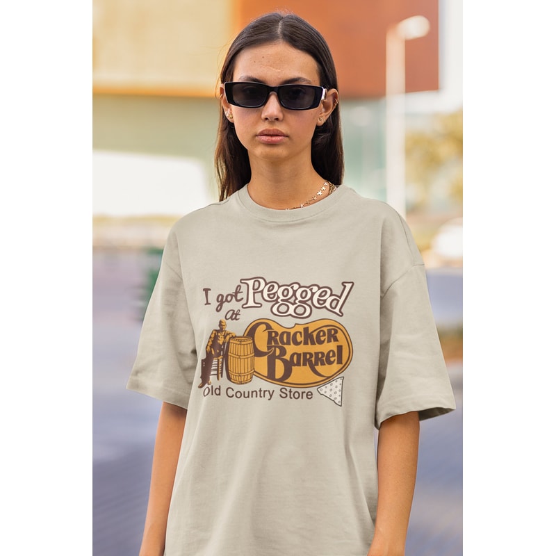 I Got Pegged At Cracker Barrel, Funny Meme Shirt, Unhinged Gift Exchange, Stupid Logo Shirt Ridiculous Swap, Offensive Shirt Inappropriate.jpg