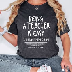 being a teacher is easy, it's like riding a bike shirt, funny teacher shirt, back to school teacher tee,cute teacher out