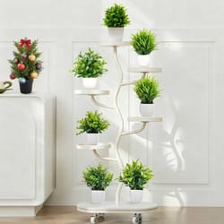 artificial christmas tree, green potted plants, diy room decor