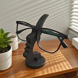 human face eyeglass holder stand, artistic storage solution for desk nightstand, practical minimalist glasses organizer
