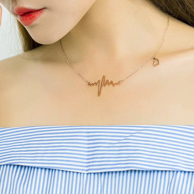 Gold & Silver Heartbeat Necklace (1).jpg