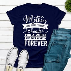 mothers hold their children's hands for a while