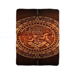 wood aztec on blanket