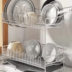 stainless steel dish drying rack over the sink with tray